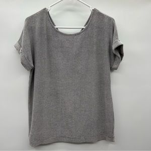 Christian Siriano black and white stripped top ladies sizeM.